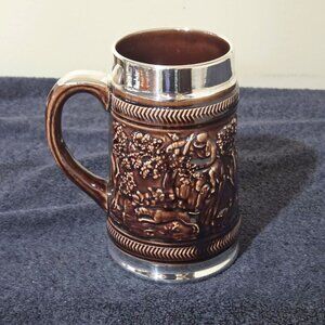 Vintage Ceramic Beer Stein – Polished Silver Rim – Embossed Hunting Scene – 5.5”